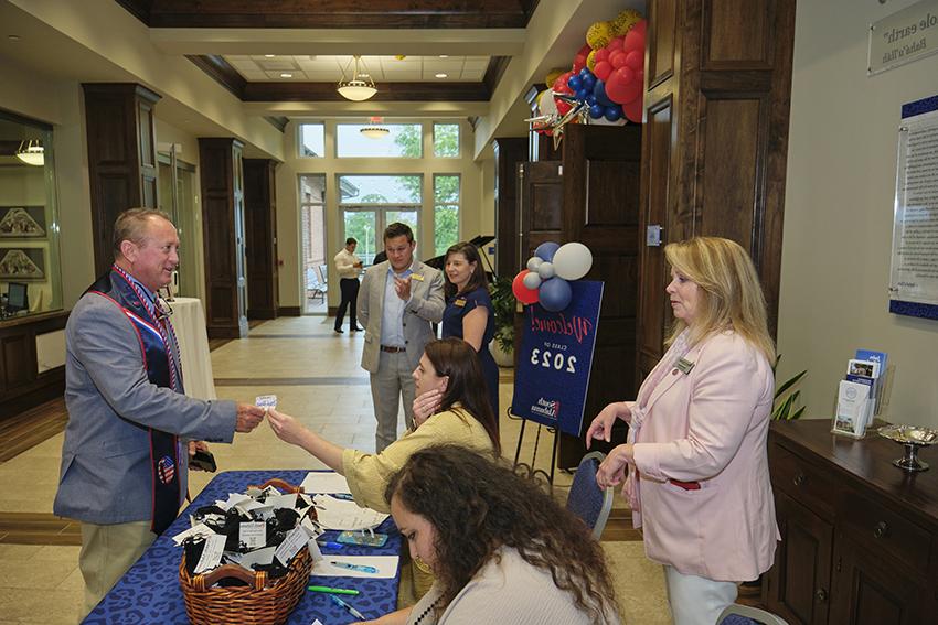 Check-In station at the Champagne Toast for future graduates