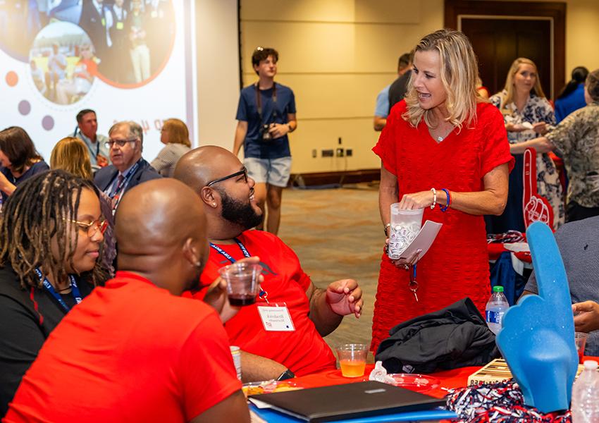 A group of alumni at an event.