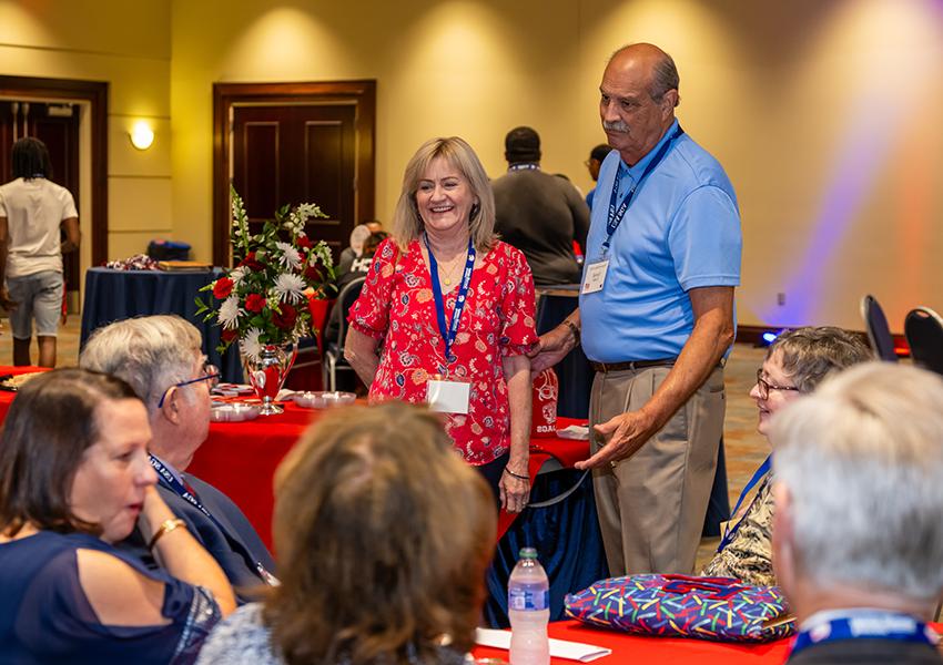 A group of alumni at an event.