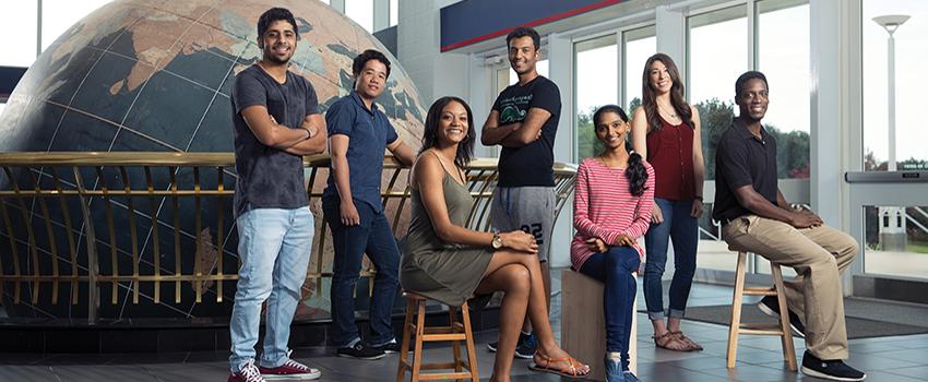 International students in front of Waterman Globe